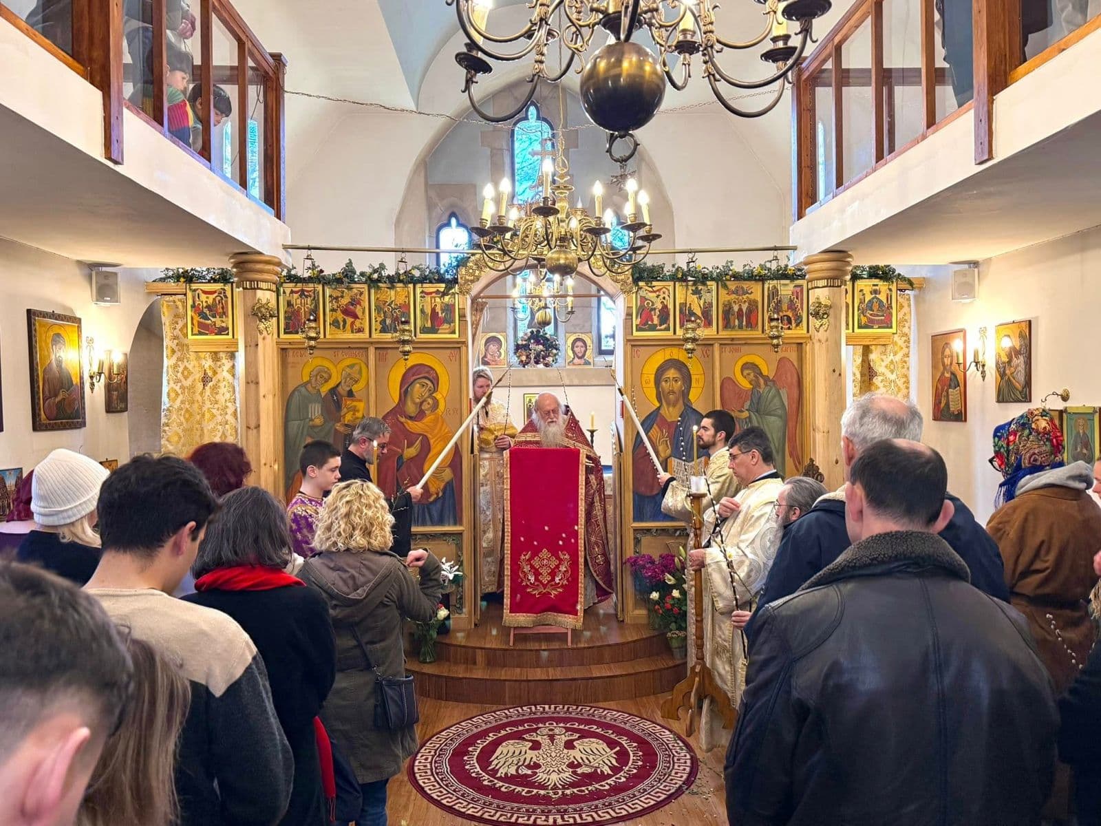 The congregation standing before the altar during the Divine Liturgy